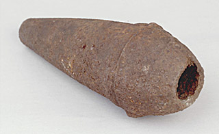 Foto einer Granatenh�lle aus Eisen